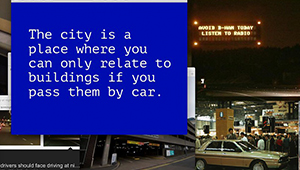 Frame from a talk by Cathy Wade on the relationships between cities, people and transport, showing an indoor car park