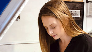 Naomi Jacques photographed with her face pointed downwards