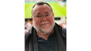 Profile photo of Paul Darke at a football stadium